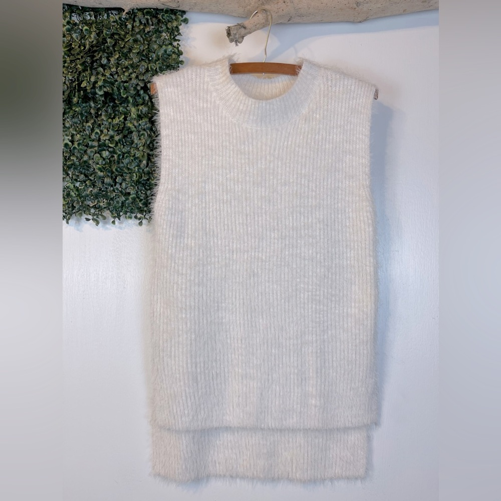 William B || what fuzzy sweater vest